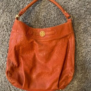 Tory Burch orange hobo bag
